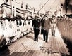 H.R.H. King George V and Commodore Bruce inspecting the crew and troops on board PLASSY, June 1917