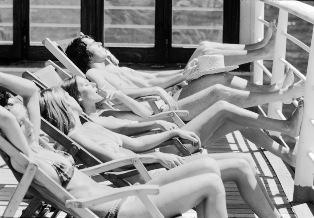Passengers sunbathing onboard CANBERRA © P&O Heritage Collection